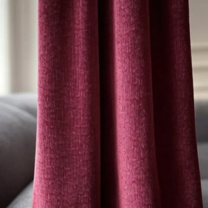 Zbliżenie struktury tkaniny zasłonowej ukazujące splot i bogatą fakturę